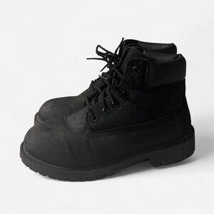 Timberland Black leather kids boots.